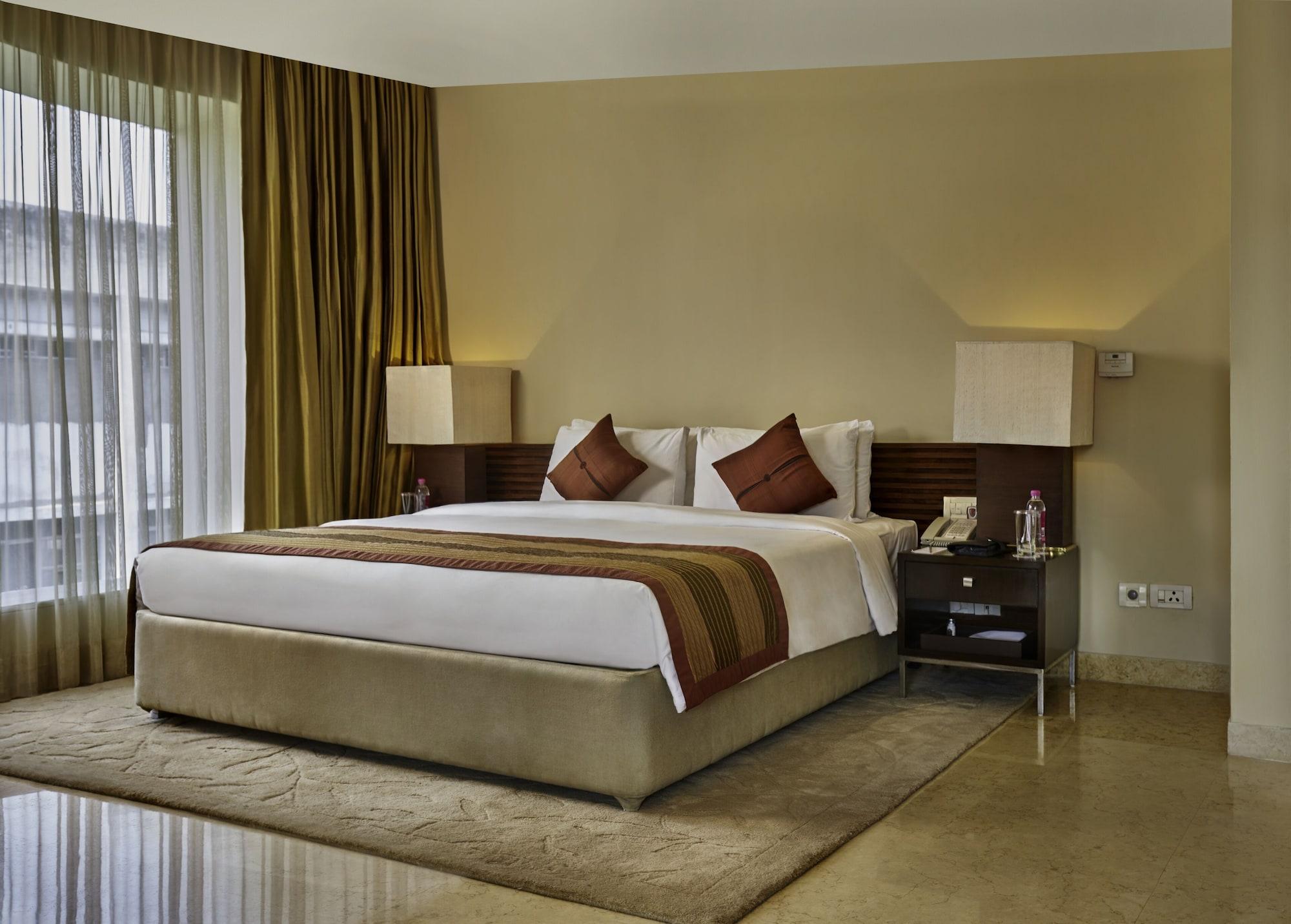 Taj Club House Hotel Chennai Luaran gambar A bedroom at the Taj Bengal